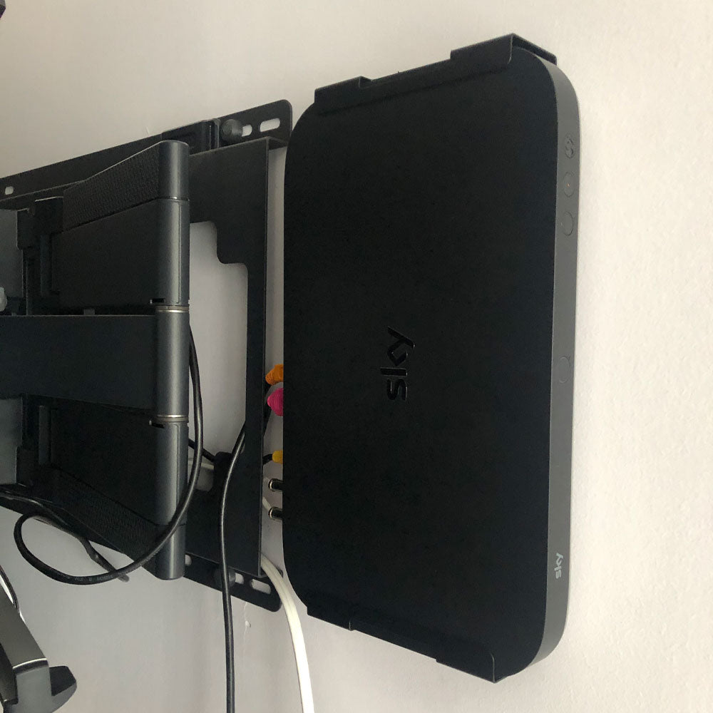 mounting sky box behind tv